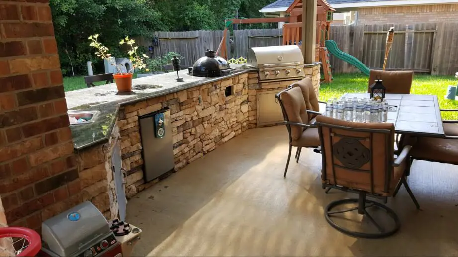 Customized Patio With Outdoor Kitchen and Kids Area